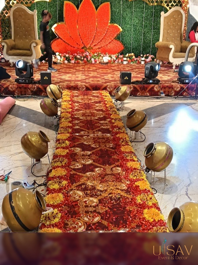 Rose petal aisle with decorative lighting